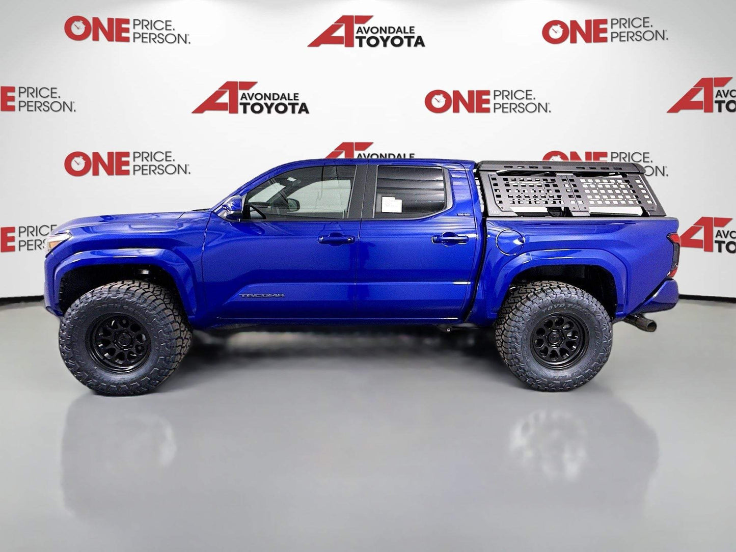 Blue 2025 Toyota Tacoma with 2025 Tacoma 2.5" Ready Lift and off-road tires installed by dealership