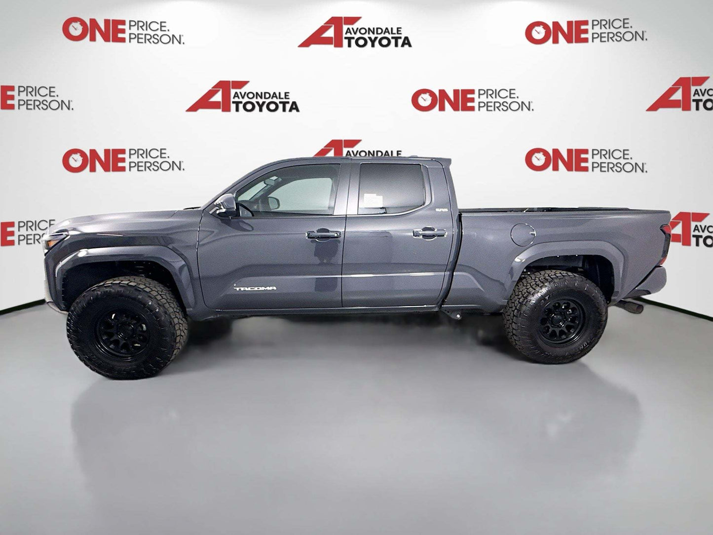 2025 Tacoma with 1.5-inch front level lift package and off-road tires in gray color