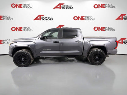 2025 Toyota Tundra with dealer-installed 1.75-inch front level lift package and black off-road wheels for lifted trucks
