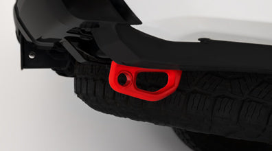 4Runner rear recovery hook with red finish securely attached to vehicle frame for off-road recovery