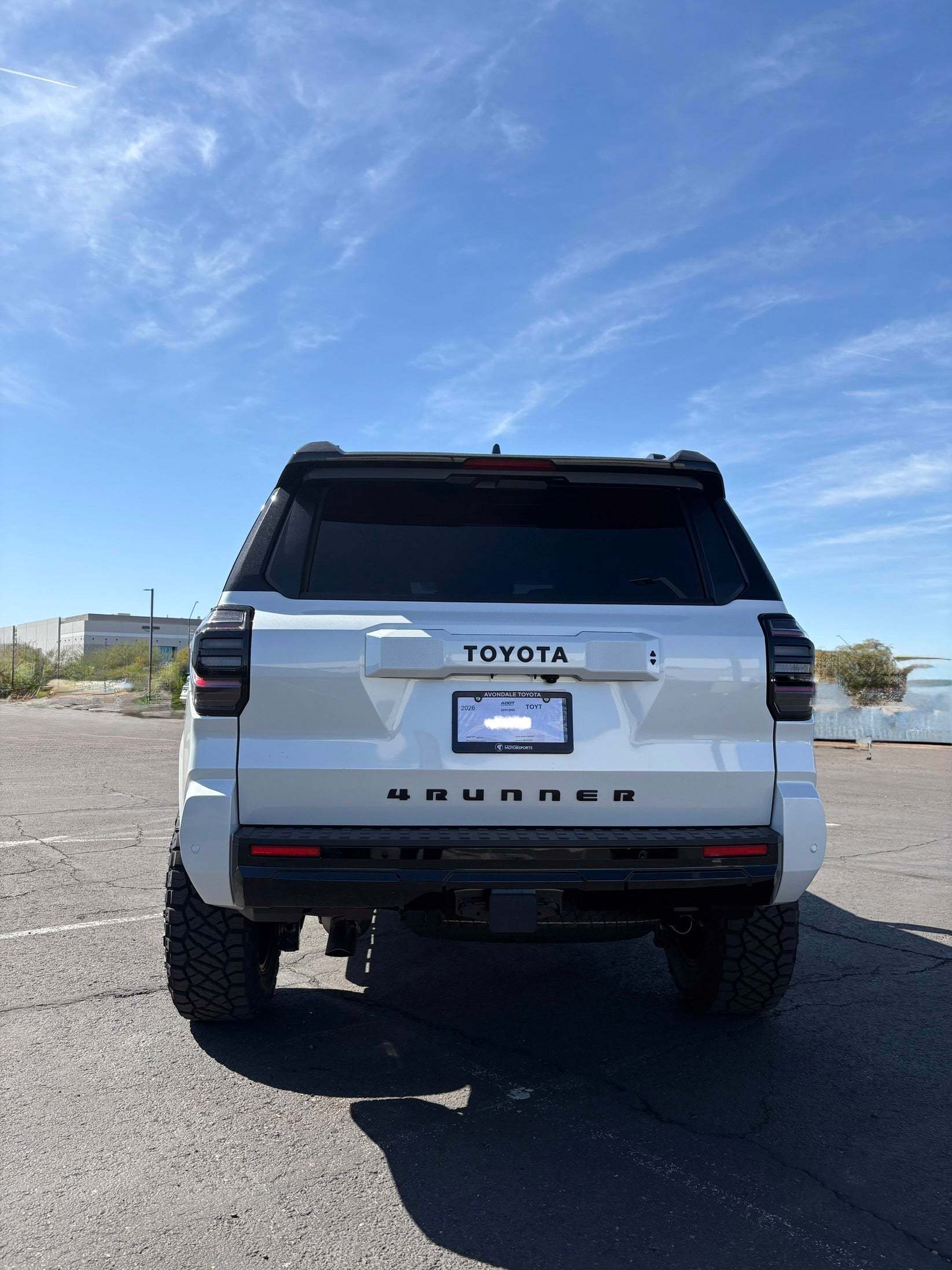 Sleek matte black Tuxedo Vehicle Wrap installed on car by Avondale Toyota Motorsports certified technicians