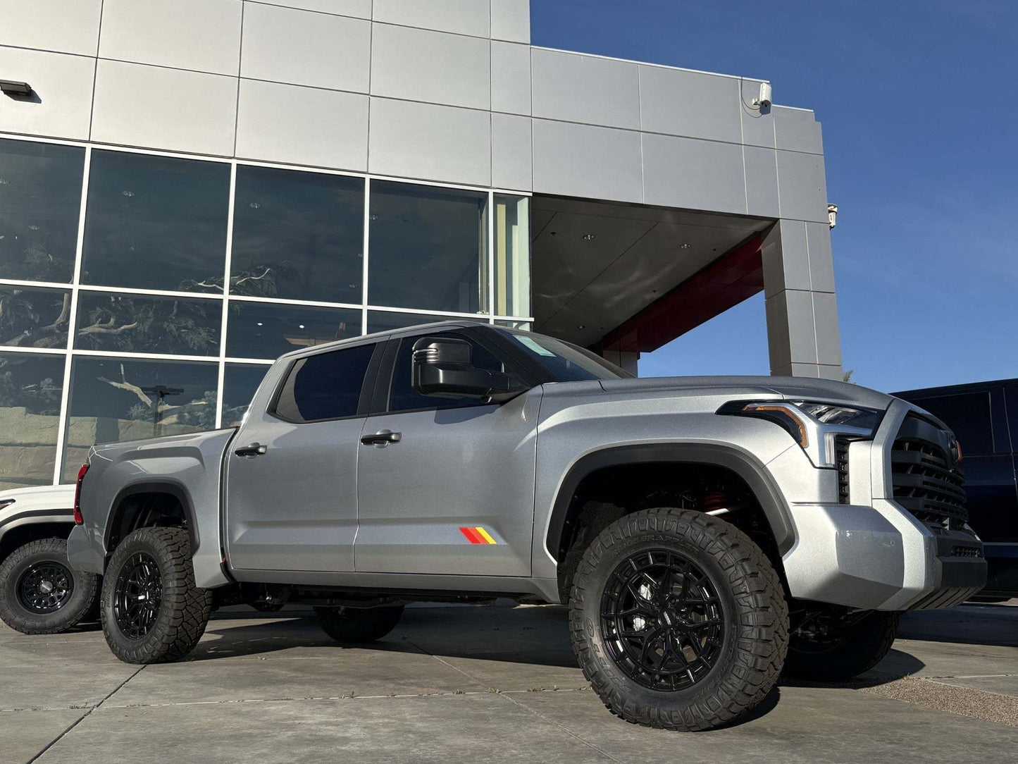 Toyota Tundra with TRD Suspension Lift Kit showing 3-inch front and 2-inch rear lift for off-road performance